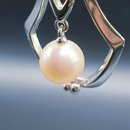 MIKIMOTO pearl necklace featuring a single 7mm pearl pendant with silver marking on 40.5cm chain