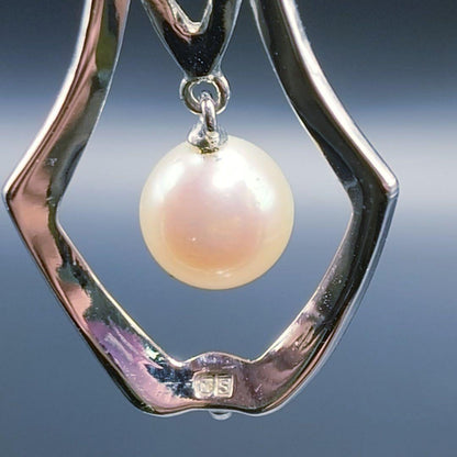 MIKIMOTO pearl necklace featuring a single 7mm pearl pendant with silver marking on 40.5cm chain