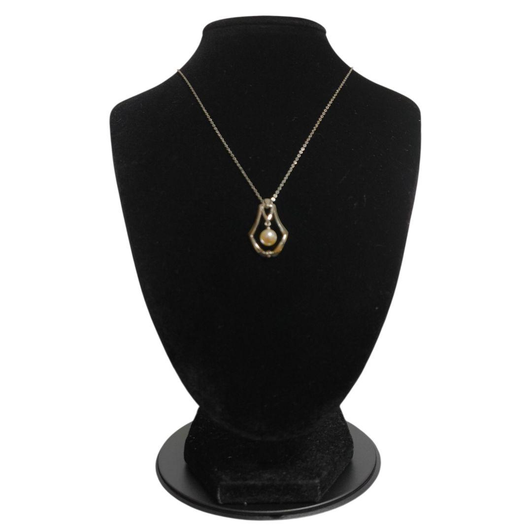 MIKIMOTO pearl necklace featuring a single 7mm pearl pendant with silver marking on 40.5cm chain
