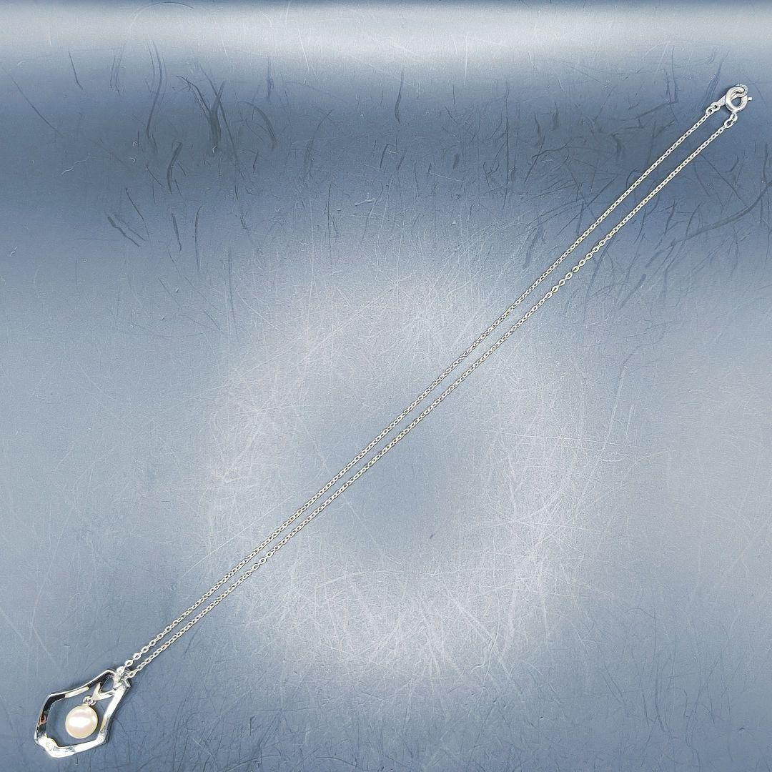MIKIMOTO pearl necklace featuring a single 7mm pearl pendant with silver marking on 40.5cm chain