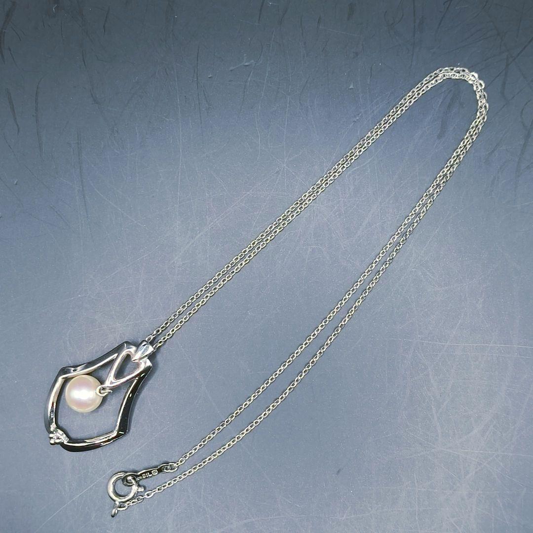 MIKIMOTO pearl necklace featuring a single 7mm pearl pendant with silver marking on 40.5cm chain