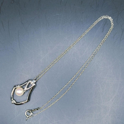 MIKIMOTO pearl necklace featuring a single 7mm pearl pendant with silver marking on 40.5cm chain