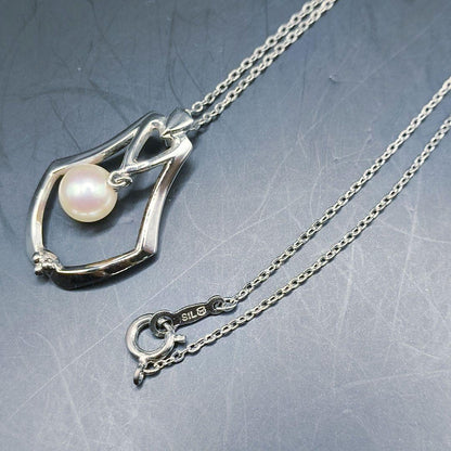 MIKIMOTO pearl necklace featuring a single 7mm pearl pendant with silver marking on 40.5cm chain