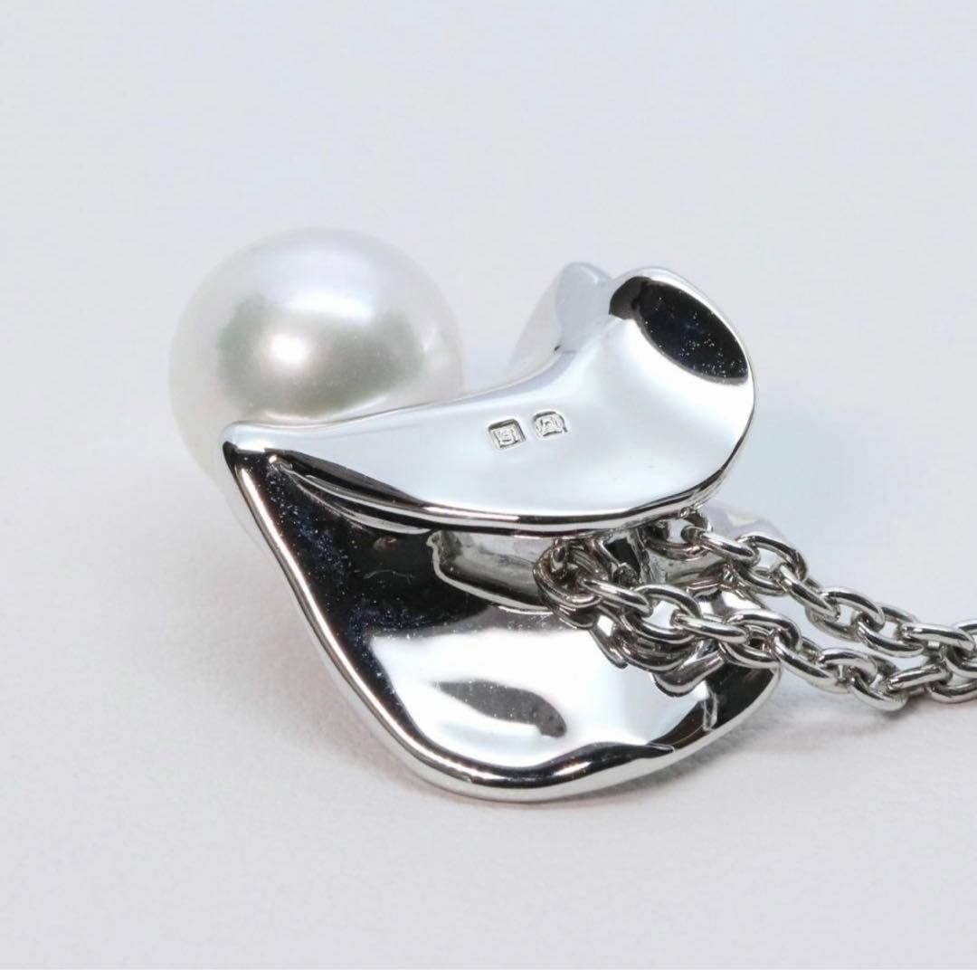 Mikimoto Silver Vendome Petal Necklace featuring a single pearl on silver petals, displayed on white background