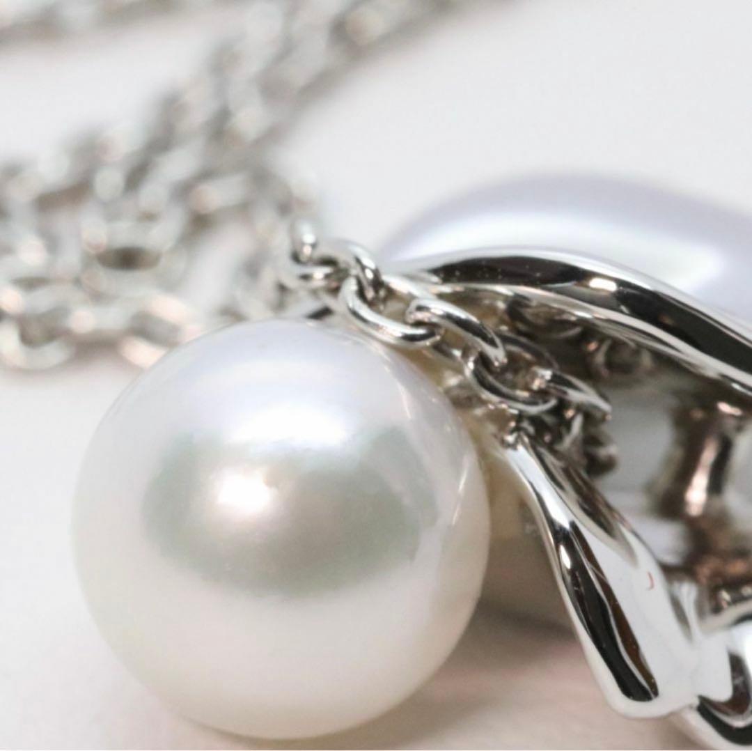 Mikimoto Silver Vendome Petal Necklace featuring a single pearl on silver petals, displayed on white background