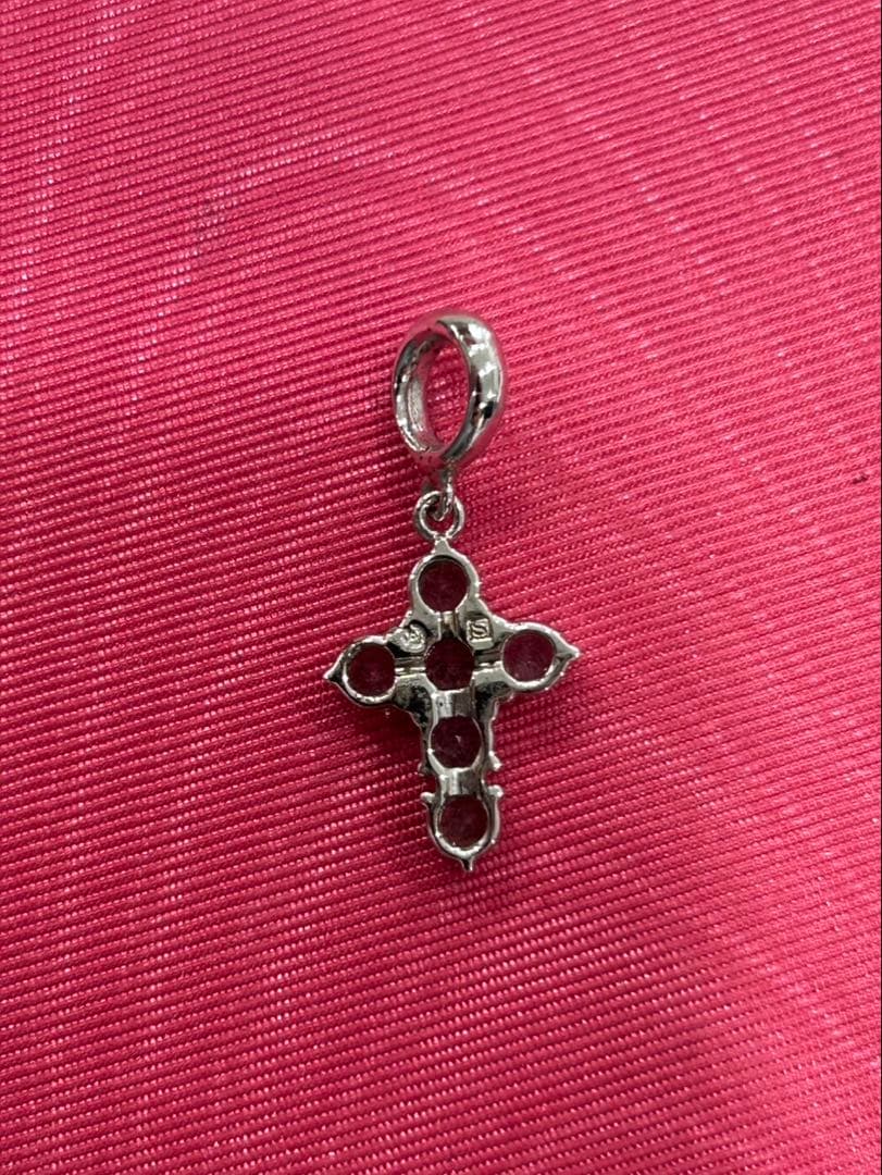 TASAKI silver cross pendant necklace with engraved design on a delicate chain