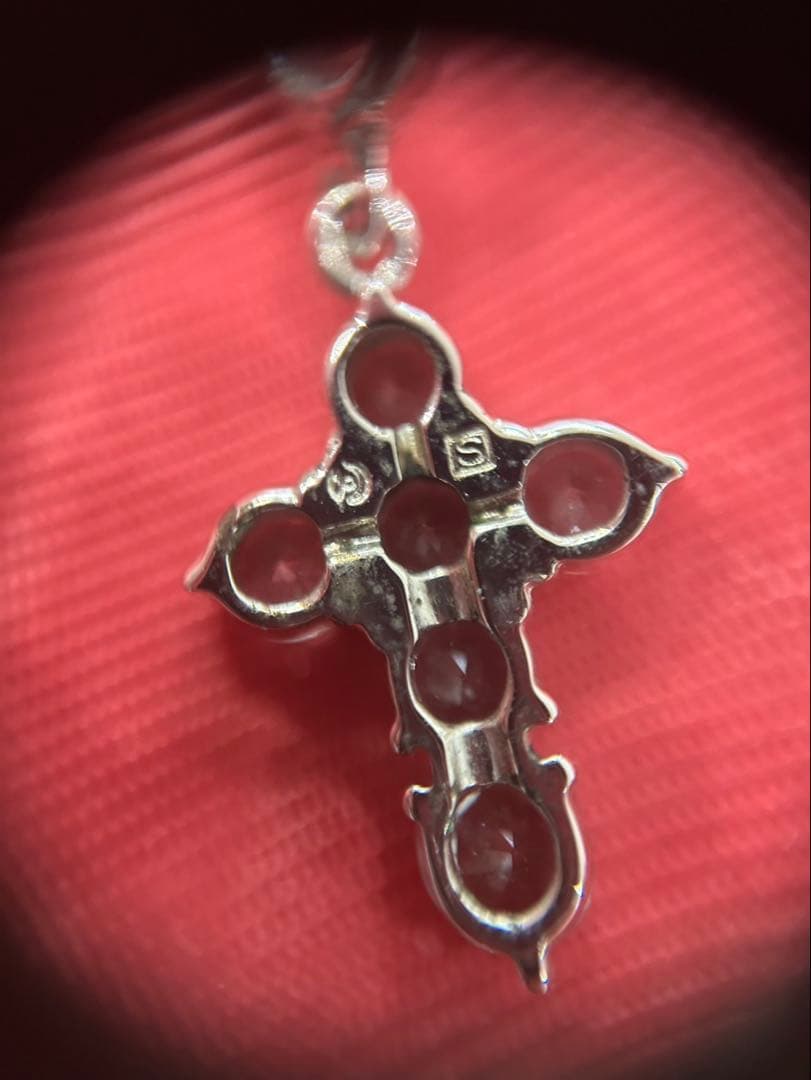 TASAKI silver cross pendant necklace with engraved design on a delicate chain