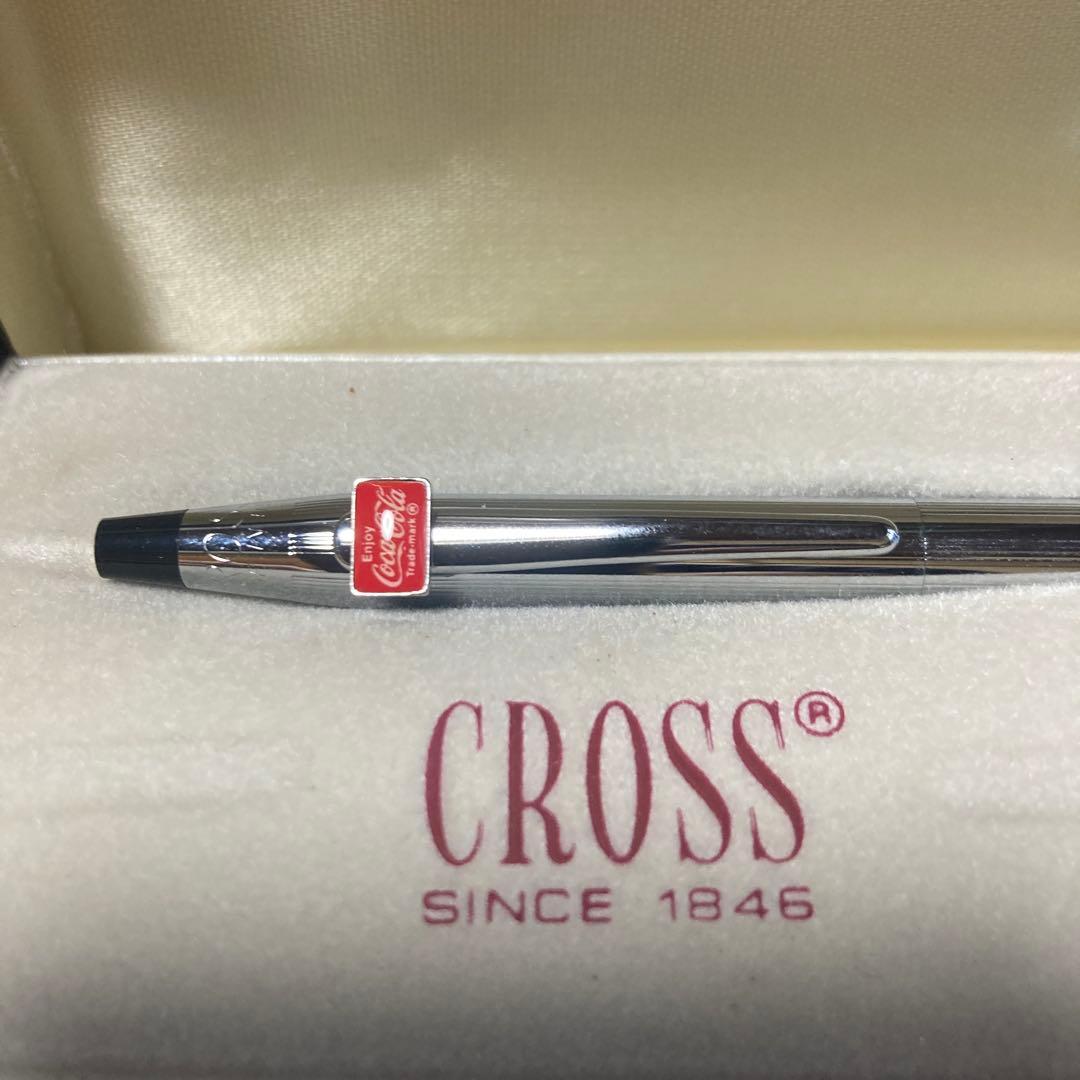 Coca-Cola CROSS ballpoint pen in sleek design with brand logo, shown in close-up on a white background