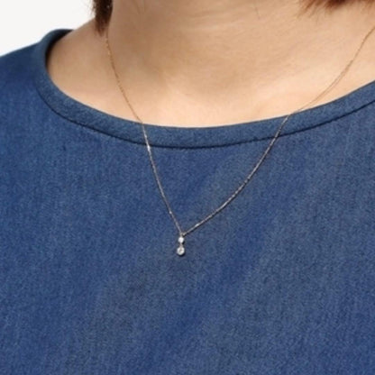 ageté 18K gold necklace with 46 cm length displayed on white background