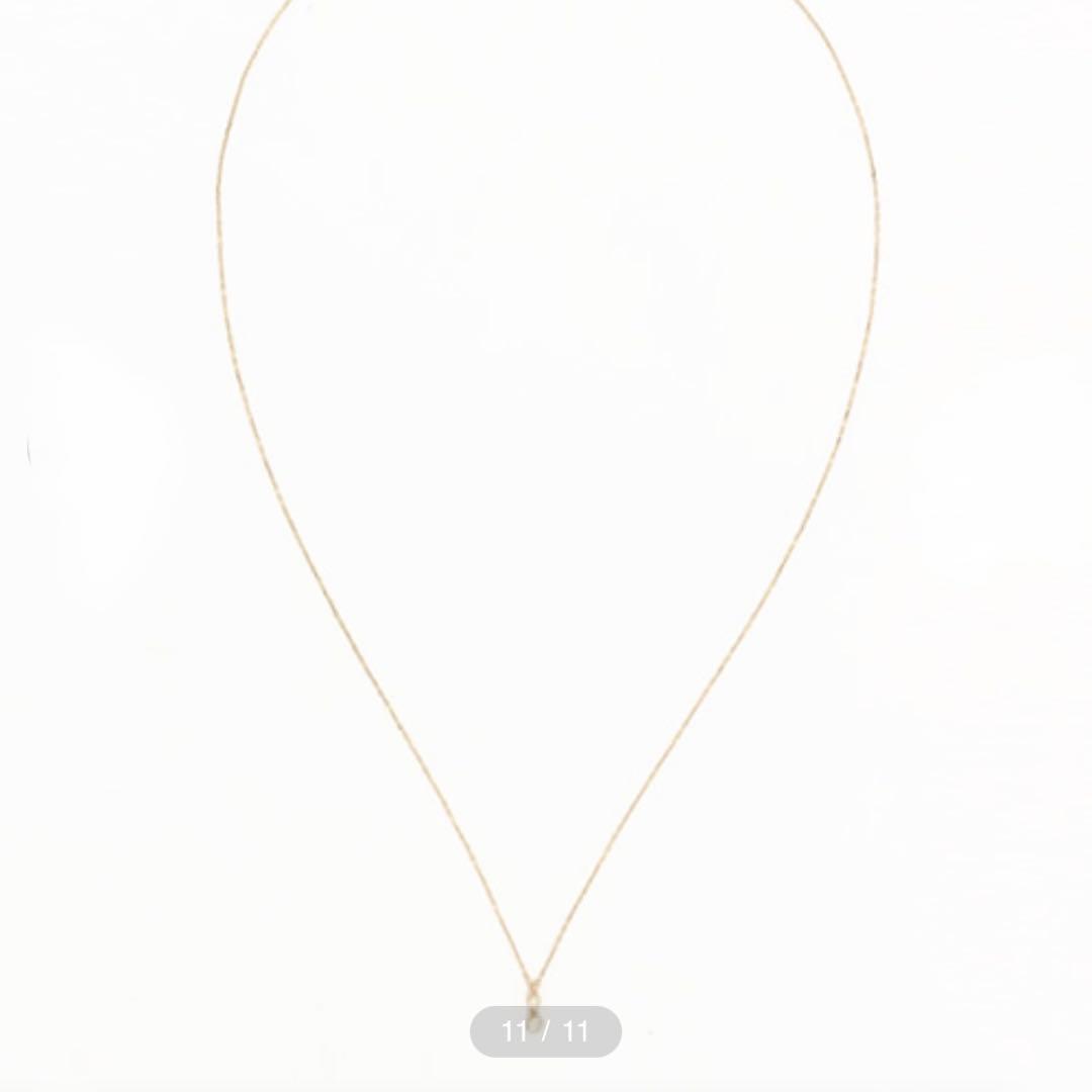 ageté 18K gold necklace with 46 cm length displayed on white background