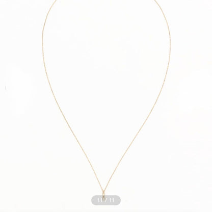 ageté 18K gold necklace with 46 cm length displayed on white background