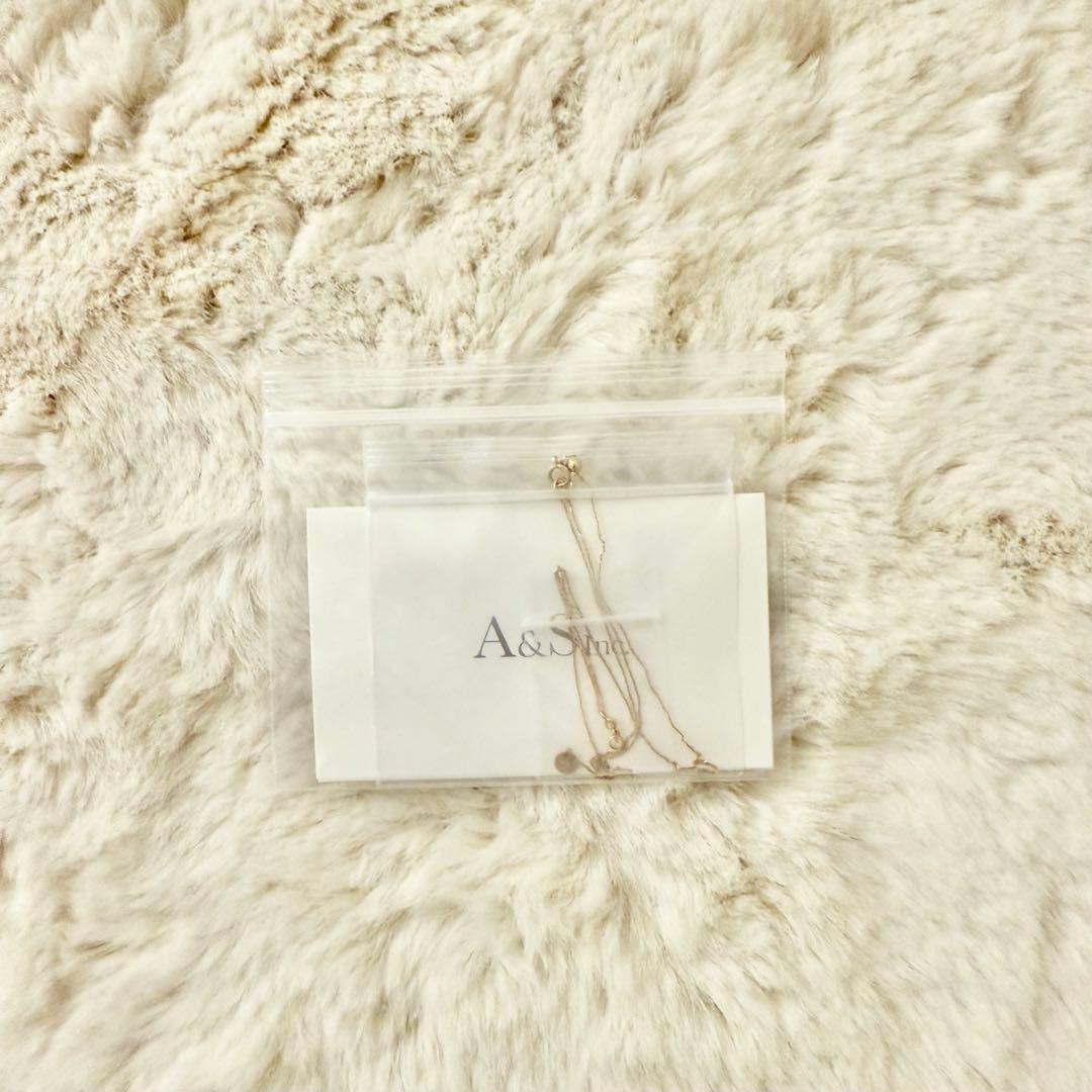 ageté 18K gold necklace with 46 cm length displayed on white background