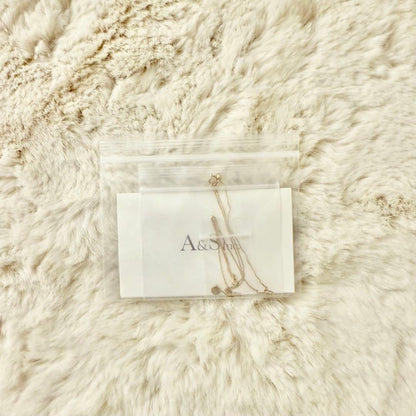 ageté 18K gold necklace with 46 cm length displayed on white background