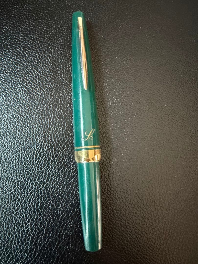 Pilot SCRIPT fountain pen with 18K nib in green color shown at a slight angle