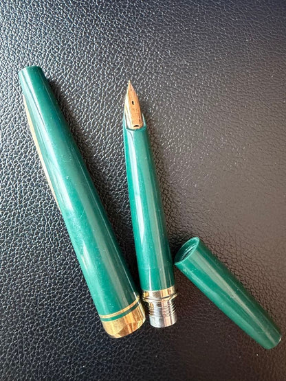 Pilot SCRIPT fountain pen with 18K nib in green color shown at a slight angle