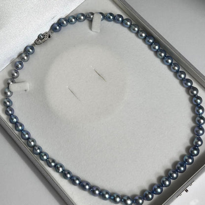 Akoya pearl necklace featuring baroque pearls with blue tint, 8.9mm size, 55.5cm length, silver clasp