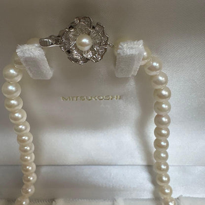 Honora Akoya Pearl Necklace featuring 6.7mm white pearls and a flower-shaped silver clasp, 42cm length