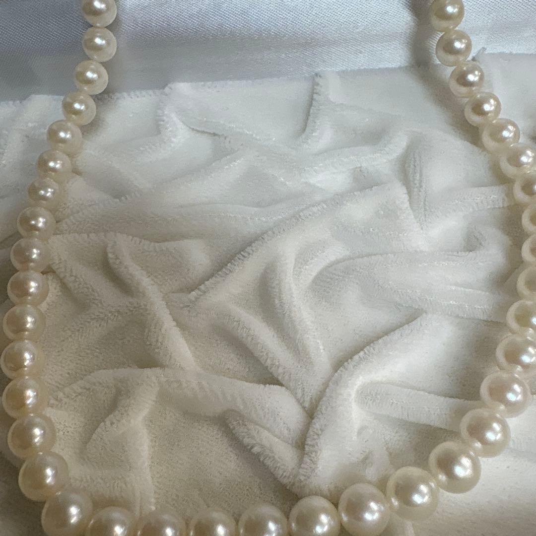 Honora Akoya Pearl Necklace featuring 6.7mm white pearls and a flower-shaped silver clasp, 42cm length