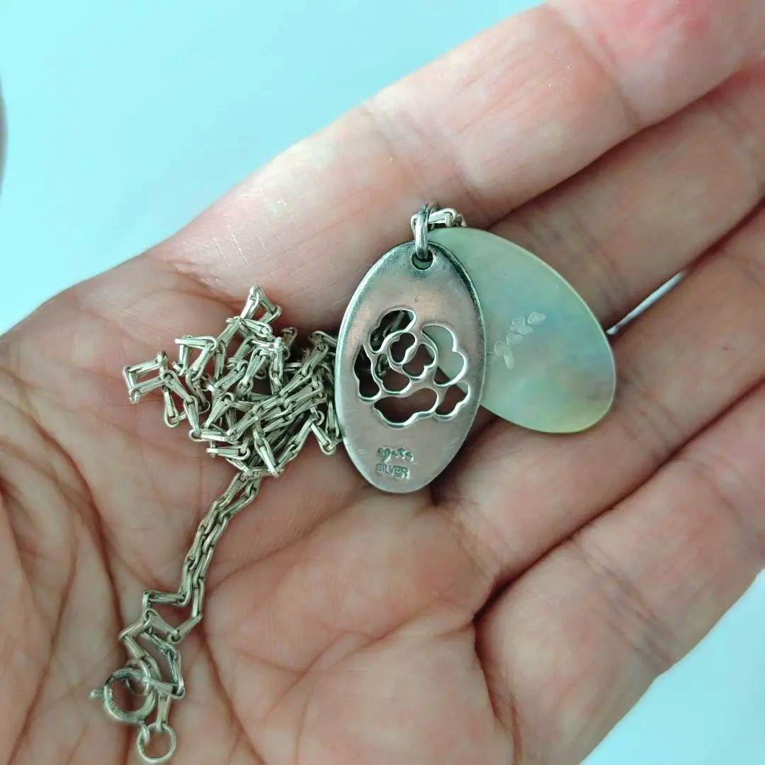 Agete silver necklace with 2.9cm shell and metal filigree charm on a 50cm chain
