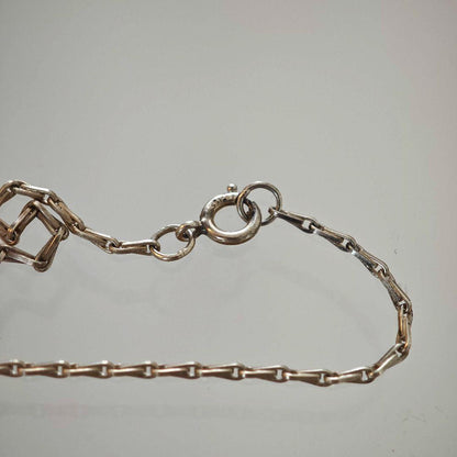Agete silver necklace with 2.9cm shell and metal filigree charm on a 50cm chain