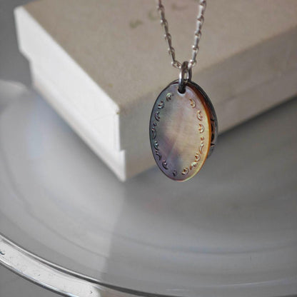 Agete silver necklace with 2.9cm shell and metal filigree charm on a 50cm chain