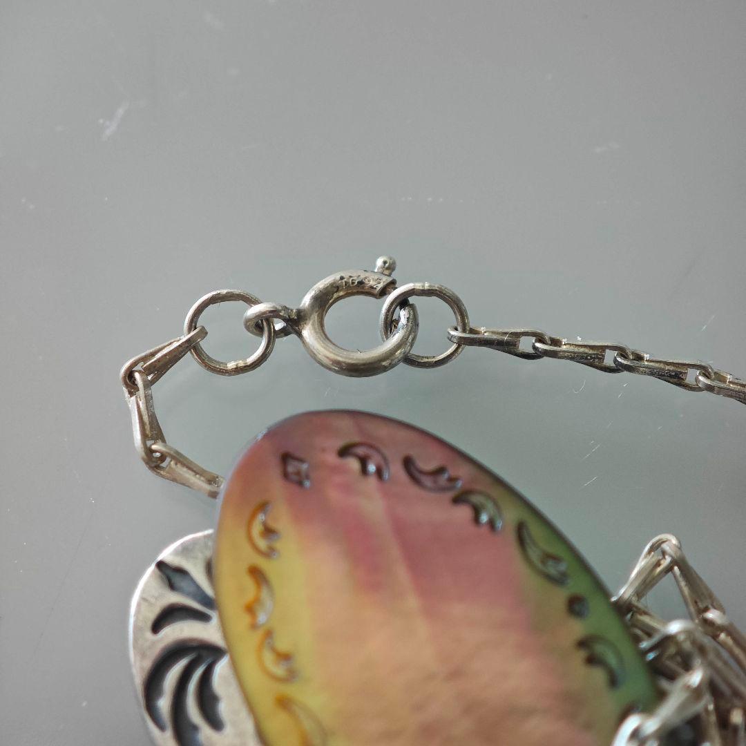 Agete silver necklace with 2.9cm shell and metal filigree charm on a 50cm chain