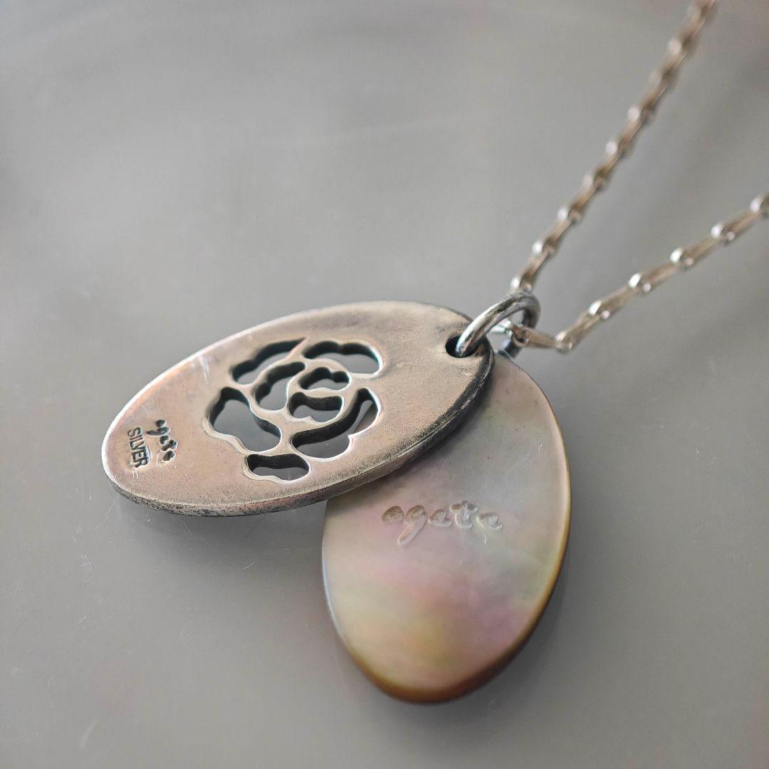 Agete silver necklace with 2.9cm shell and metal filigree charm on a 50cm chain