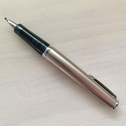 Pilot Timeline retractable ballpoint pen in champagne gold with tip protection cap and cylindrical case