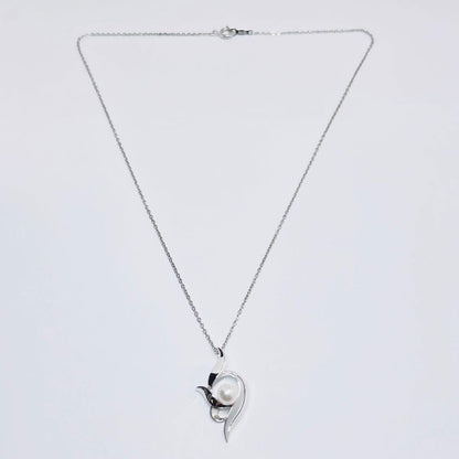 MIKIMOTO pearl necklace pendant with 5.9mm pearls on a 40cm silver chain