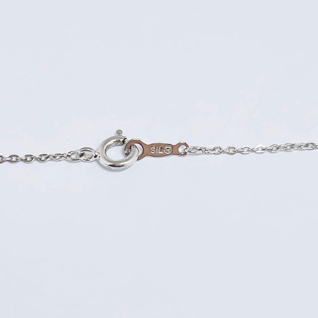MIKIMOTO pearl necklace pendant with 5.9mm pearls on a 40cm silver chain