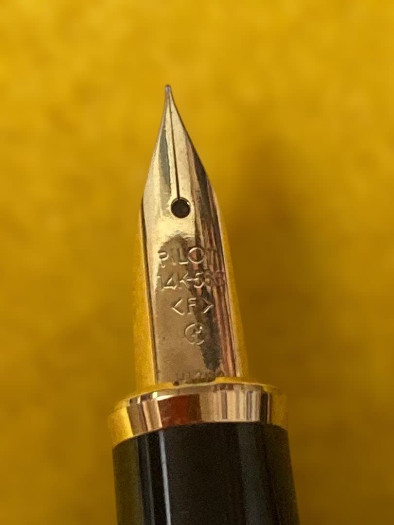 14K Gold Nib PILOT Fountain Pen in black and gold with commemorative Japanese engraving on barrel