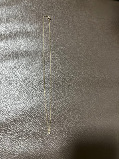 agate K10 10 karat gold diamond necklace 0.01 carat with simple casual design and gold color
