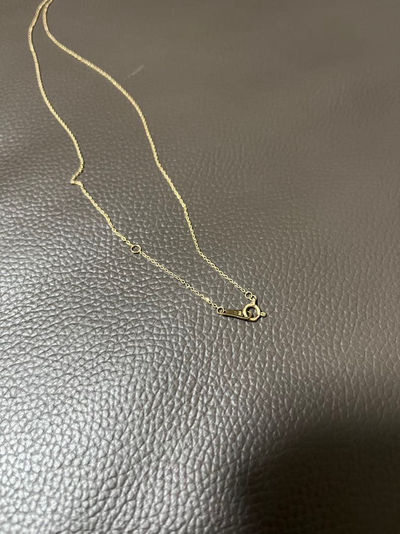 agate K10 10 karat gold diamond necklace 0.01 carat with simple casual design and gold color