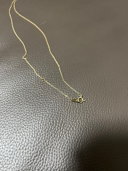 agate K10 10 karat gold diamond necklace 0.01 carat with simple casual design and gold color