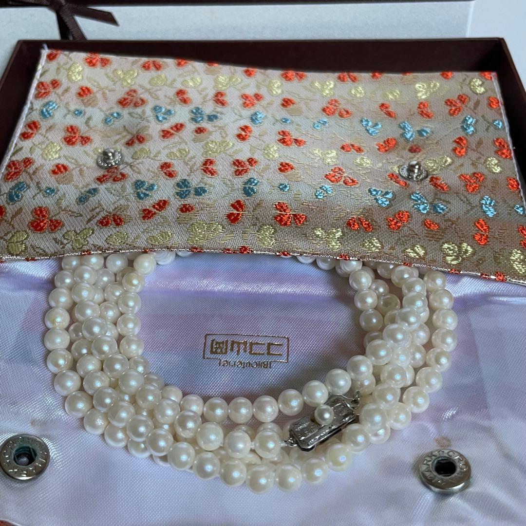 Akoya genuine pearl necklace with 5mm round white pearls measuring 114cm in length