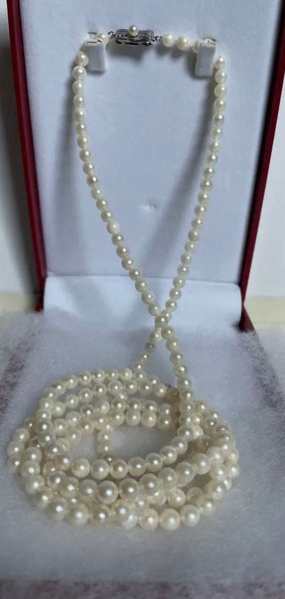 Akoya genuine pearl necklace with 5mm round white pearls measuring 114cm in length