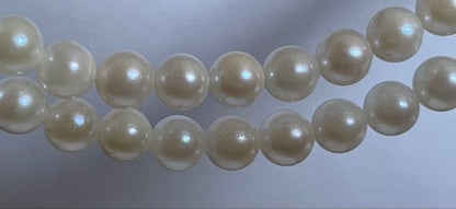 Akoya genuine pearl necklace with 5mm round white pearls measuring 114cm in length