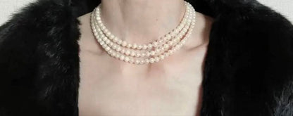 Akoya genuine pearl necklace with 5mm round white pearls measuring 114cm in length