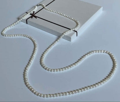 Akoya genuine pearl necklace with 5mm round white pearls measuring 114cm in length