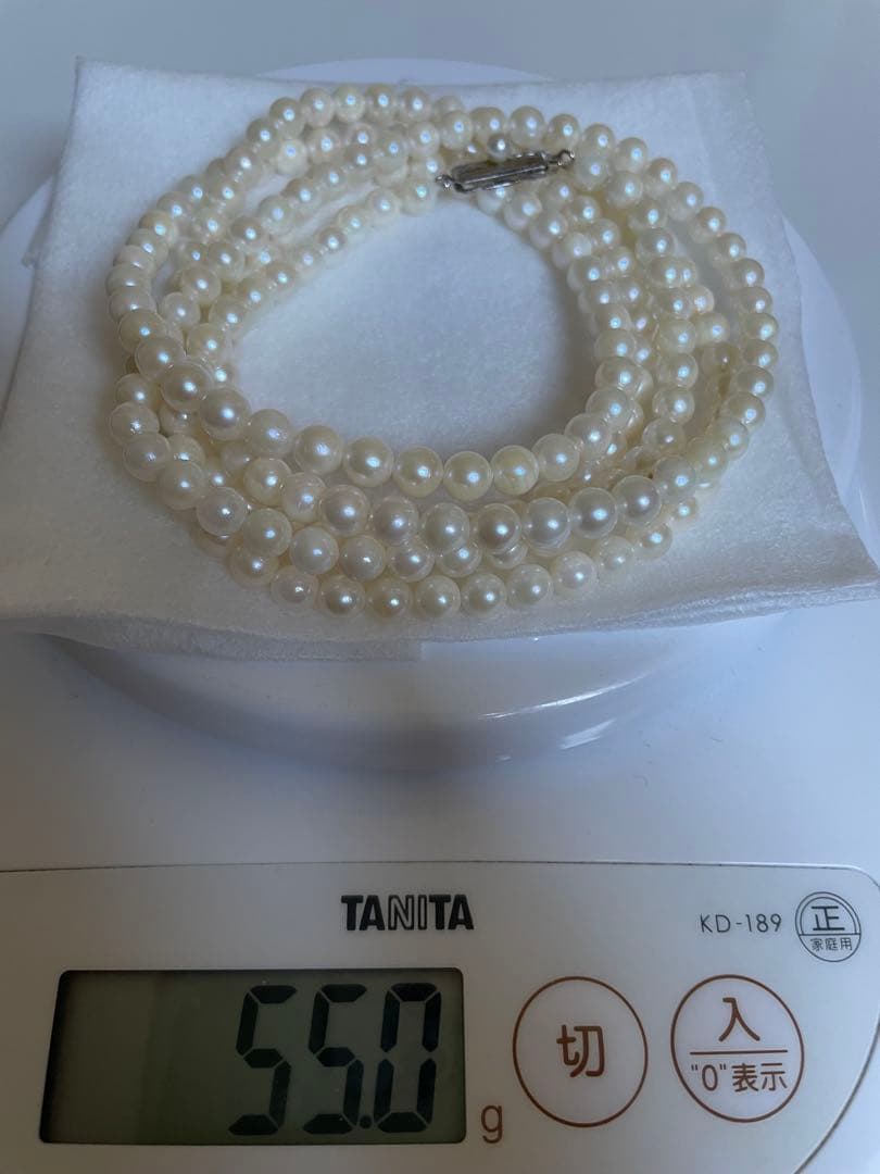 Akoya genuine pearl necklace with 5mm round white pearls measuring 114cm in length
