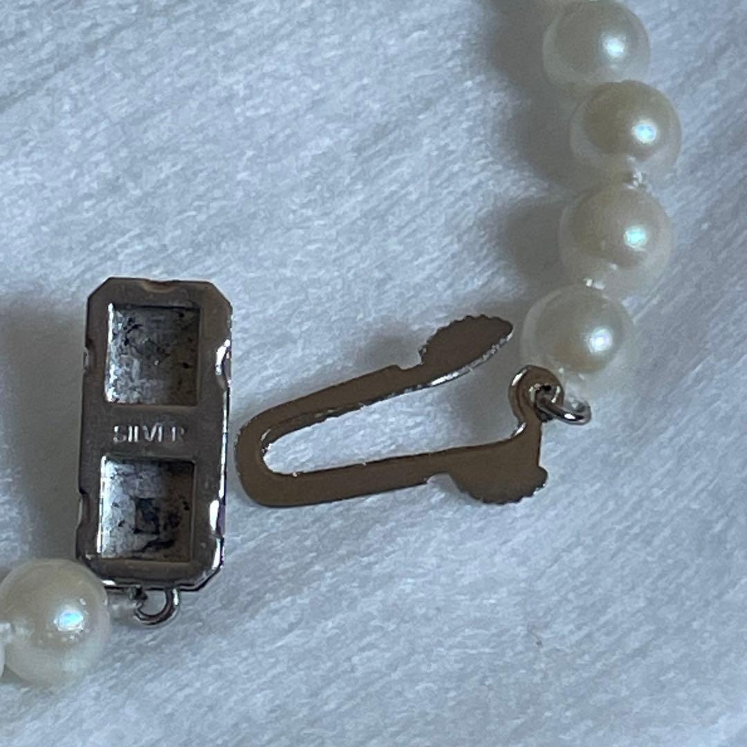 Akoya genuine pearl necklace with 5mm round white pearls measuring 114cm in length