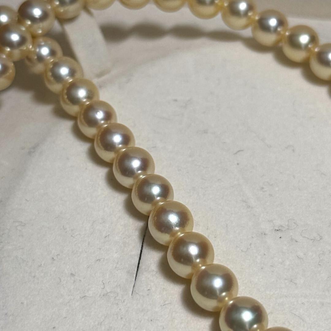 Tasaki Golden Pearl Akoya pearl necklace with 7.0-7.5 mm pearls and silver clasp on a 43 cm chain