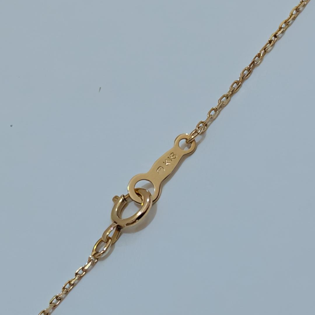 Mikimoto pearl necklace featuring a 7.3mm pearl and diamond set in 18K yellow gold with 42cm chain