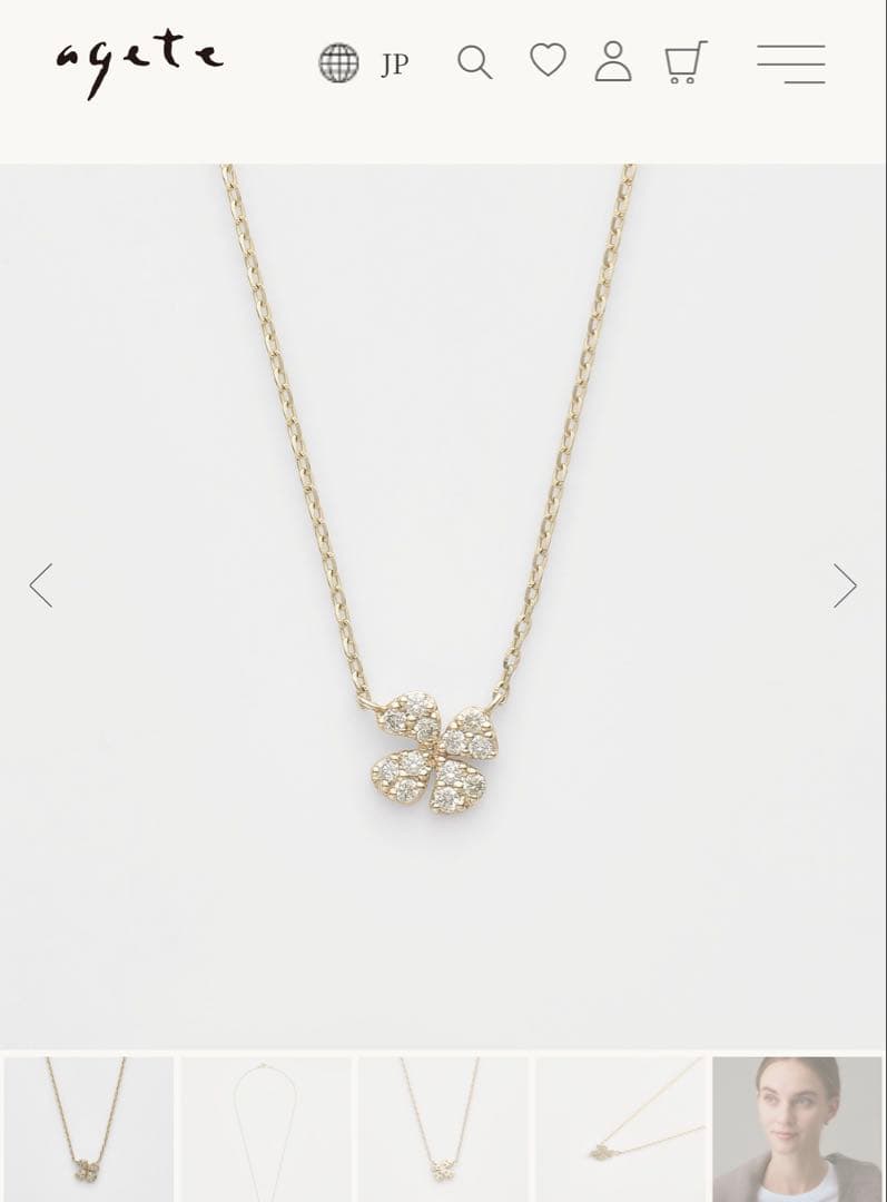 agete K10 gold tone diamond necklace with 0.05ct clover pendant displayed on white background