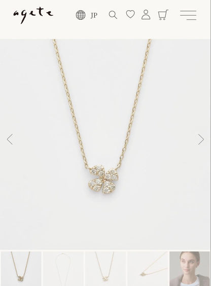 agete K10 gold tone diamond necklace with 0.05ct clover pendant displayed on white background