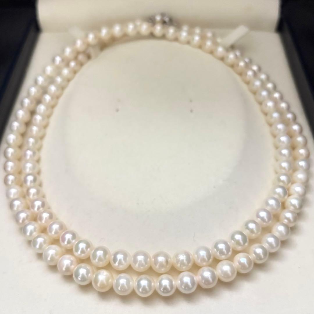 Long Akoya pearl necklace with two strands of round white pearls 7.5mm in size