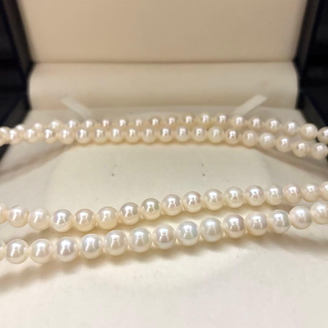 Long Akoya pearl necklace with two strands of round white pearls 7.5mm in size