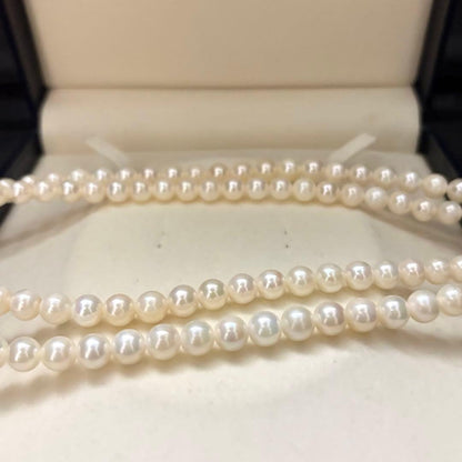 Long Akoya pearl necklace with two strands of round white pearls 7.5mm in size