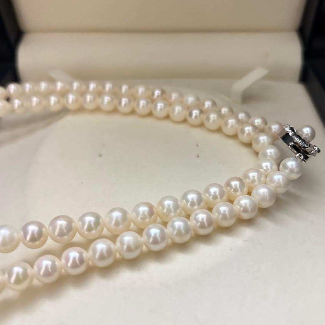 Long Akoya pearl necklace with two strands of round white pearls 7.5mm in size