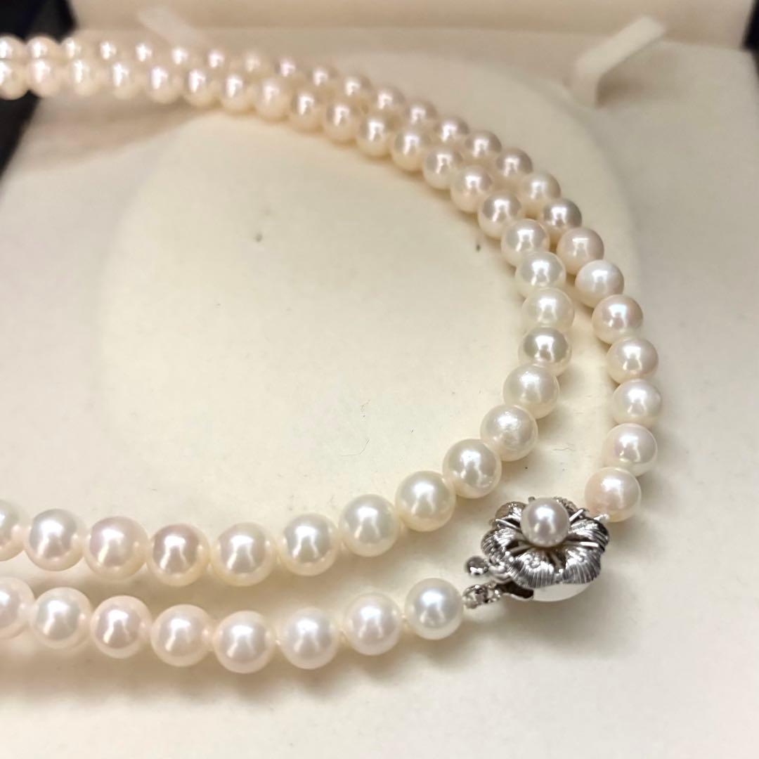 Long Akoya pearl necklace with two strands of round white pearls 7.5mm in size